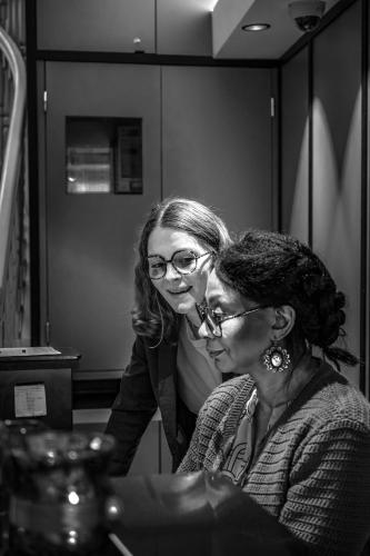 two women standing next to each other in a room at Grand Hotel de la Gare, Angers in Angers