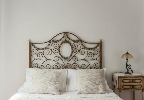 Ένα ή περισσότερα κρεβάτια σε δωμάτιο στο Casa Resende- Parking included