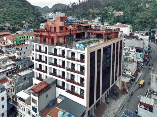 an overhead view of a building in a city at Cat Ba Viet Hoa Hotel & Residence - Pool & Bar in Cat Ba