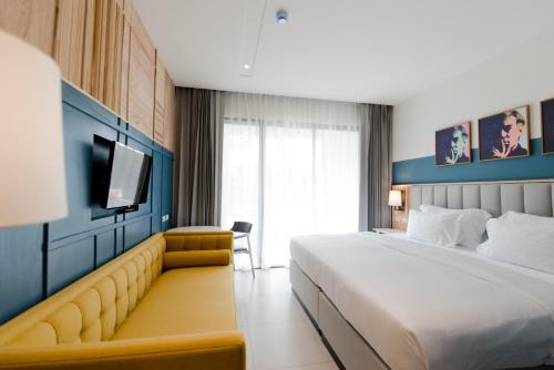 Postel nebo postele na pokoji v ubytování Sugar Marina Hotel - ART - Karon Beach