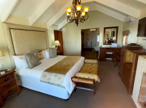 Cama o camas de una habitación en Paternoster Manor