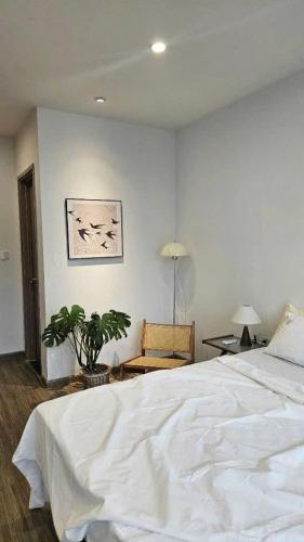 Ένα ή περισσότερα κρεβάτια σε δωμάτιο στο Studio Apt At OceanPark