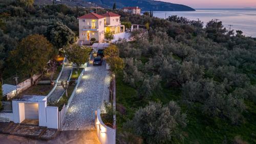 an aerial view of a house with a street at Ridomo Sea View Villas Camellia & Jasmine in Avia