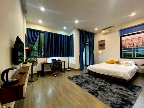 Giường trong phòng chung tại Mandala Home & Coliving Space