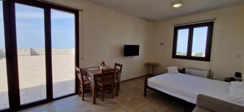 Ένα ή περισσότερα κρεβάτια σε δωμάτιο στο Daniel's Apartments