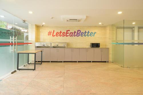 a kitchen with a sign that reads lease cafeteria at Housr Sector 28 Gurgaon Near IFFCO Chowk Metro Station in Gurgaon