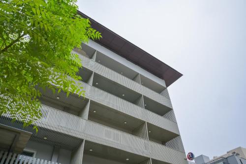 an external view of a building at Housr Sector 28 Gurgaon Near IFFCO Chowk Metro Station in Gurgaon