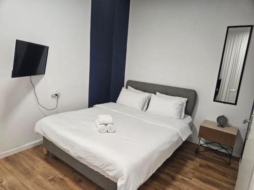 Postel nebo postele na pokoji v ubytování GODSON TALPIOT