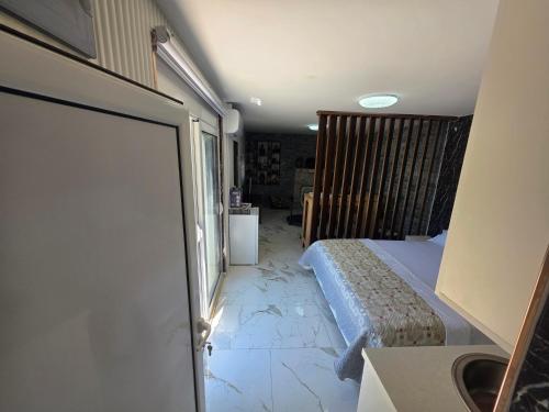Ένα ή περισσότερα κρεβάτια σε δωμάτιο στο La Casa Di Martin