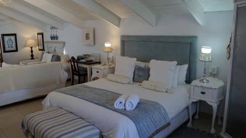 Cama o camas de una habitación en Paternoster Manor