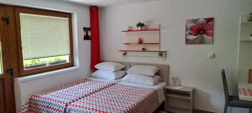 Postel nebo postele na pokoji v ubytování Plitvice ZG