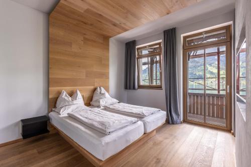 Postel nebo postele na pokoji v ubytování Seehotel Bellevue by keyone
