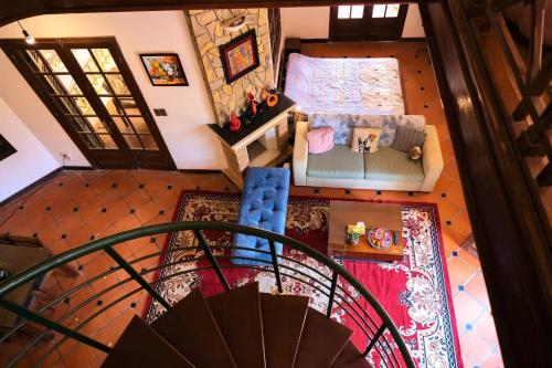 an overhead view of a living room with a couch at Vườn Tùng RiverSide retreat & Villa - KDT ECOPARK in Kim Quan