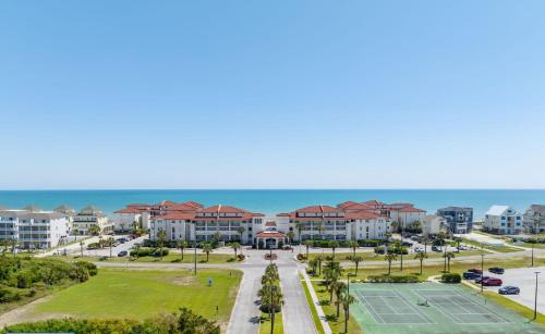 an aerial view of a resort with a tennis court at Villa Capriani 218B Oceanfront with Pool at North Topsail Beach in Chadwick Acres