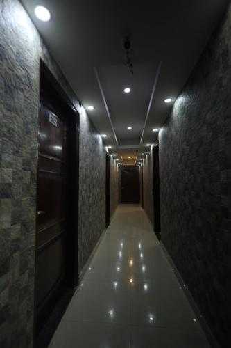 a dark hallway with at The Paramant Near Delhi IGI Airport in New Delhi