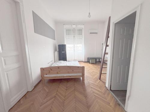 Posteľ alebo postele v izbe v ubytovaní Artist Guest House