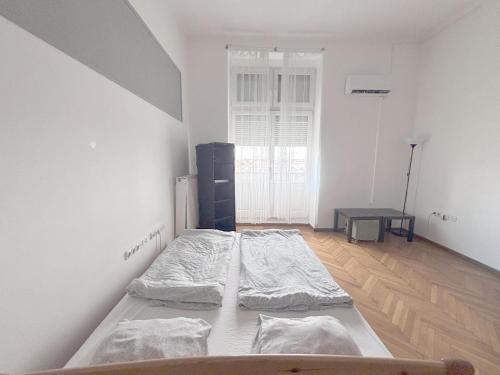 Posteľ alebo postele v izbe v ubytovaní Artist Guest House