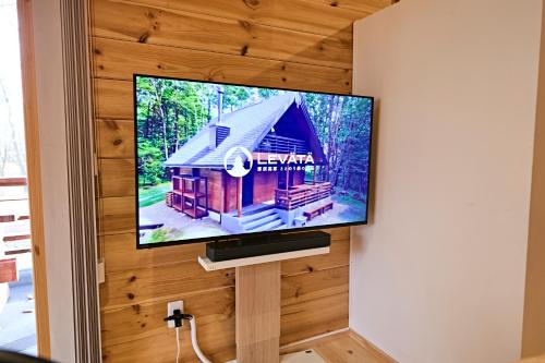 a flat screen tv hanging on a wall at LEVATA in Nasu