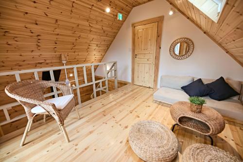 a living room with a couch and a table at LEVATA in Nasu