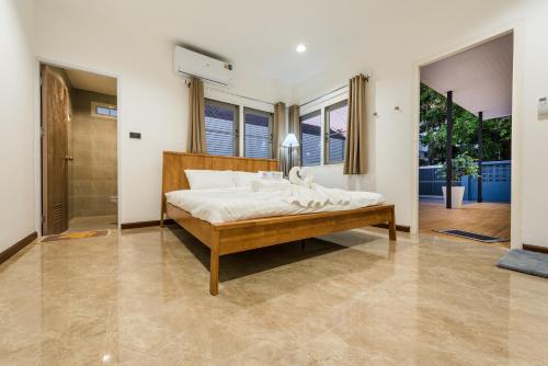 Voodi või voodid majutusasutuse Coco59- Private 3BR Pool Villa toas