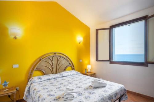 Ένα ή περισσότερα κρεβάτια σε δωμάτιο στο Nello's house