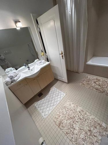a bathroom with a sink and a mirror at Copenhagen Denmark by the Sea Villa Solrd Strand in Solrød Strand
