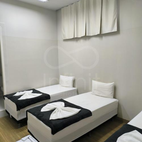 Katil atau katil-katil dalam bilik di Infinit Hotel Flats