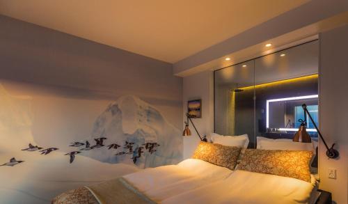 Postel nebo postele na pokoji v ubytování Hotel Arctic