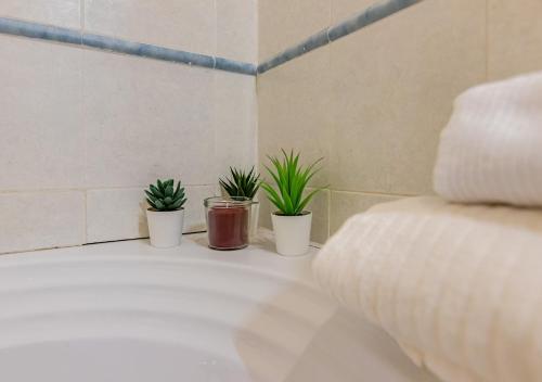 Ванная комната в -Cavour 4- 2 Bedrooms near the Leaning Tower