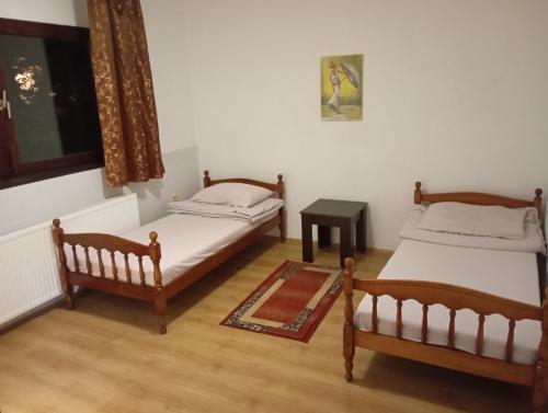 Postel nebo postele na pokoji v ubytování Zamak
