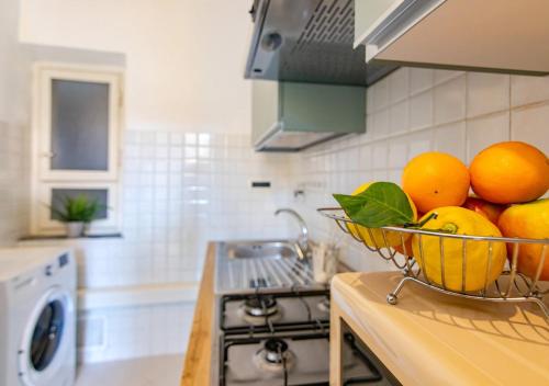 Кухня или мини-кухня в -Cavour 4- 2 Bedrooms near the Leaning Tower
