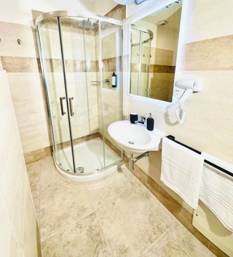 Koupelna v ubytování Hotel Paradise Rooms