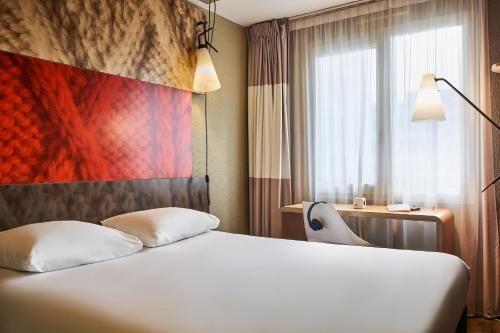 Postel nebo postele na pokoji v ubytování Ibis Irun
