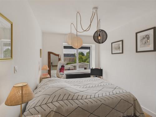 Posteľ alebo postele v izbe v ubytovaní Maison pour 4 classée 3 étoiles - Terrasse - Guilvinec