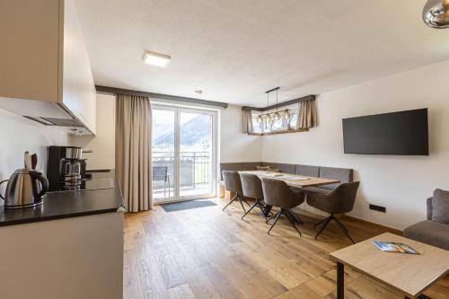 Kuchyň nebo kuchyňský kout v ubytování Zugspitz Suites Lermoos by ALPS RESORTS