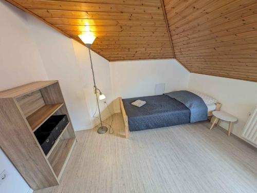 En eller flere senge i et værelse på Holiday home in Balatonfenyves 35176