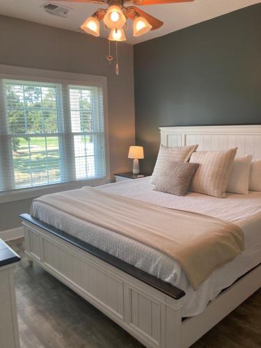 Un ou plusieurs lits dans un hébergement de l'établissement Birdie on the Green