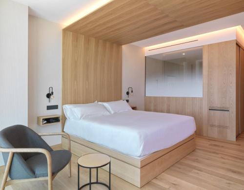 Letto o letti in una camera di Noa Boutique Hotel