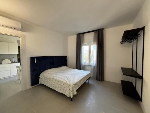 En eller flere senge i et værelse på Il Giardino su Spezia