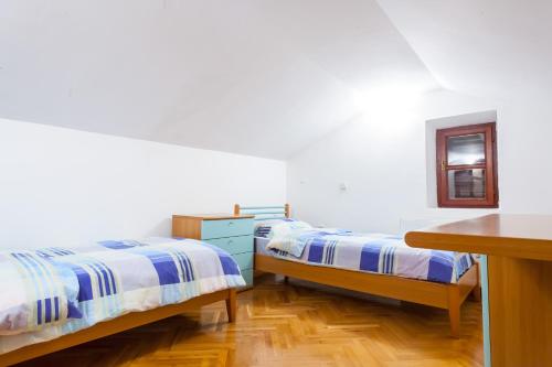 Cama o camas de una habitación en Villa & Apartments Perasto