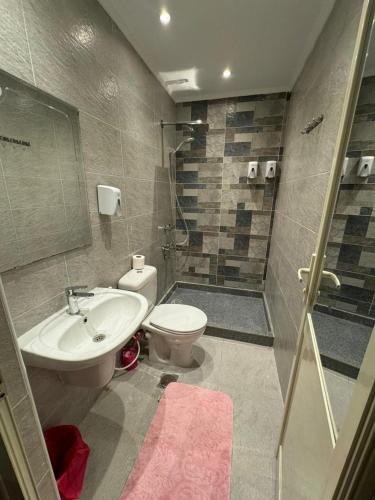 Koupelna v ubytování Sama hotel