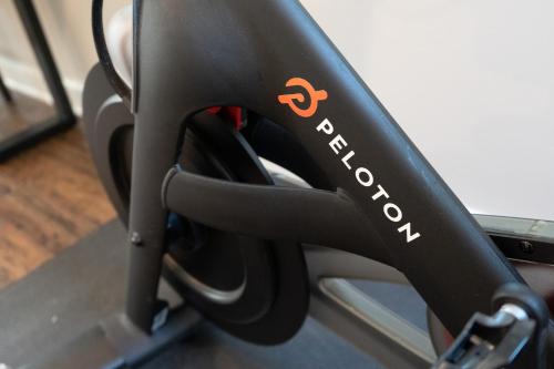 a black bike seat with an orange logo on it at The Eloise by Stay Local Nashville in Nashville