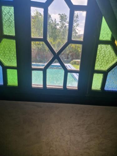 Kolam renang di atau dekat dengan Villa Jenate Serenitée et paix