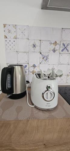 a toaster sitting on top of a kitchen counter at Garibaldi Apartment Sanremo in Sanremo