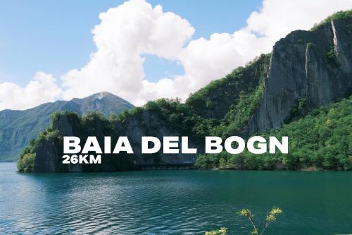 a view of a lake with mountains in the background at La Rocca Terrazza in Darfo