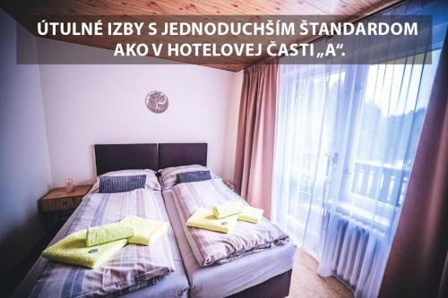 Postel nebo postele na pokoji v ubytování Wellness & Spa Hotel Čertov