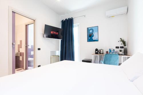 Katil atau katil-katil dalam bilik di Città Studi Suites 1 - Top Collection