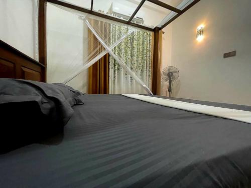 Postel nebo postele na pokoji v ubytování 07th Heaven Villa