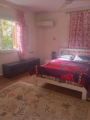 Ένα ή περισσότερα κρεβάτια σε δωμάτιο στο The White Oasis Family Villa