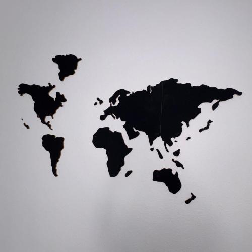 a black map of the world on a wall at Alicante aeropuerto y playa in El Altet